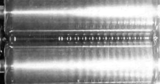 Картины волнообразования (при использовании технического масла) при перекосе зазора от 0,4 справа до 1,2 слева мм
